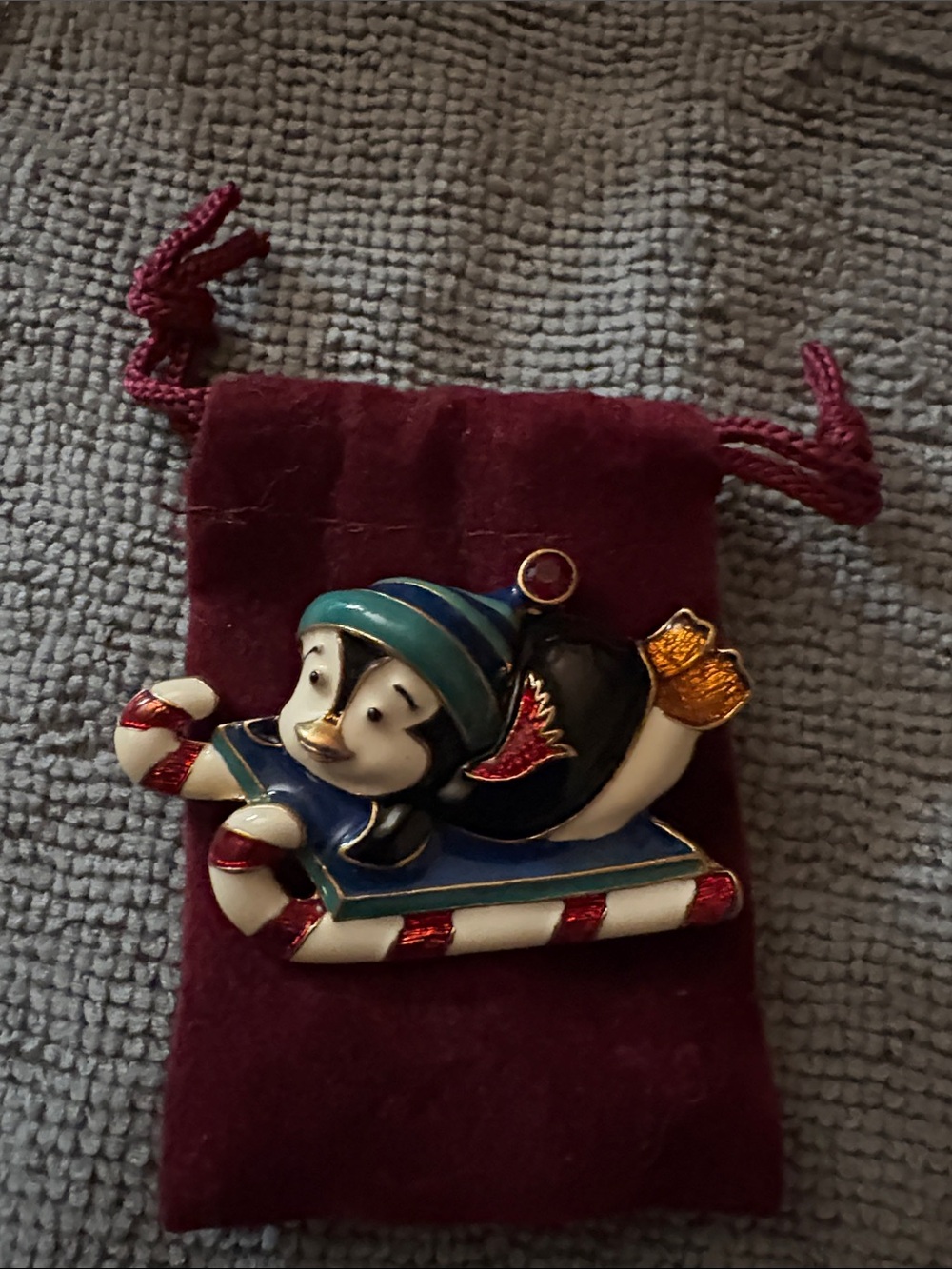 Holiday Penguin Enamel Brooch in Blue, Black, White and Red